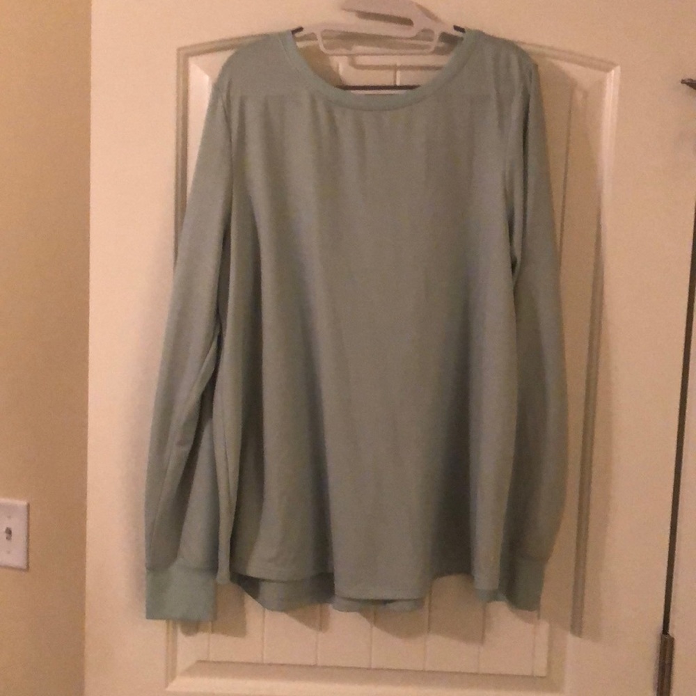 Long sleeve sea foam color sweatshirt with v-back